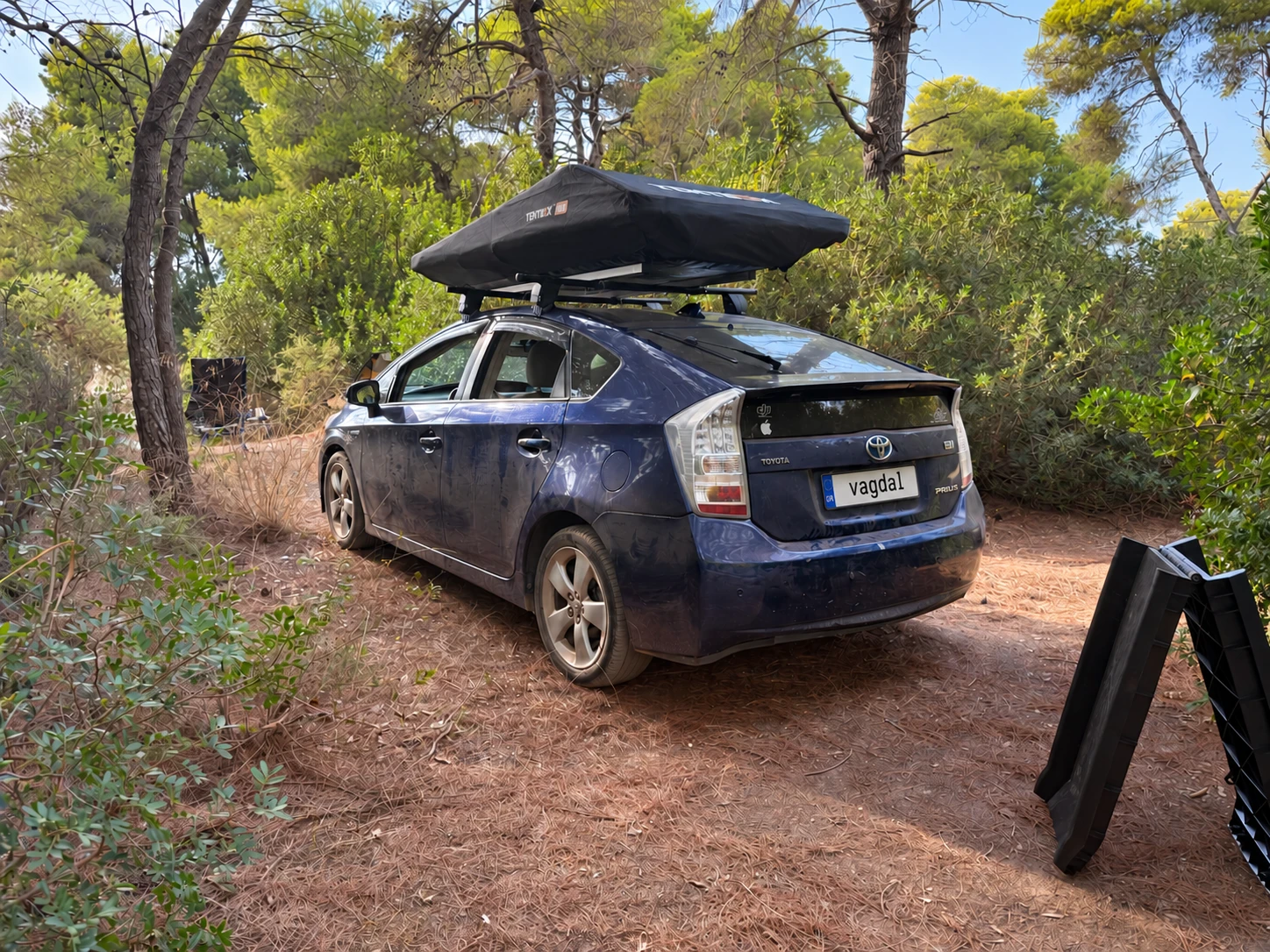 The tent closed inside its soft travel cover.